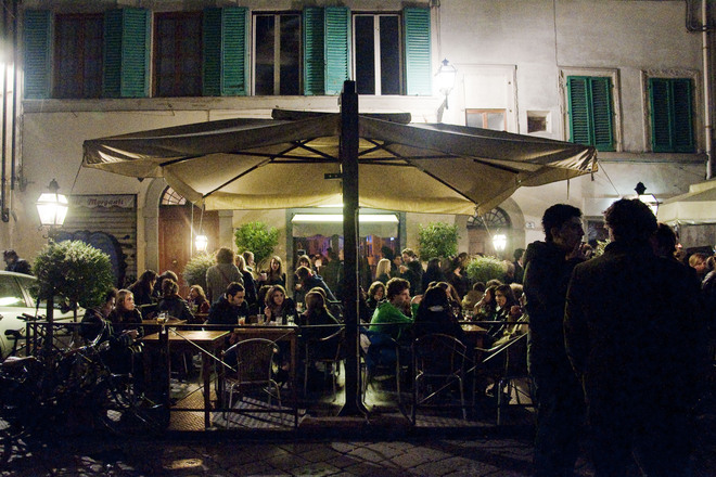 People drinking and chatting the night away at Cabiria in Florence. 
