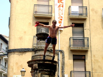 Fountain Jumping - Party in Pamplona: The Running of the Bulls.