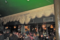 Lining up along the bar waiting to get a drink at the at The Dogstar in Brixton. 