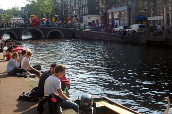 Hanging out by the canals on a sunny day in Amsterdam.