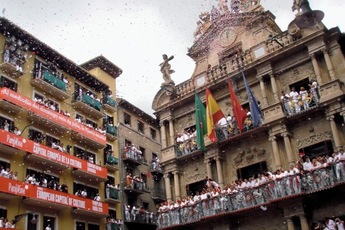 Cheering from the balconies in Pamplona.