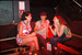 Girls hanging out and chatting at (le) poisson rouge in New York.
